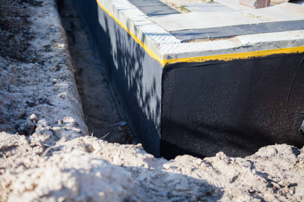 Professional Waterproofing technician working in Rio, WI